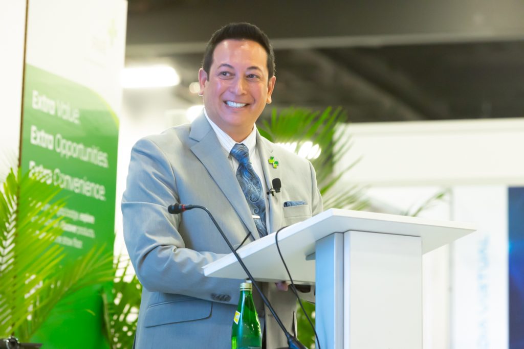 Kenneth C. Wong, MBA, FACHE, speaking at a healthcare conference