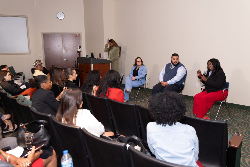 Community members and health professionals at a community health education program