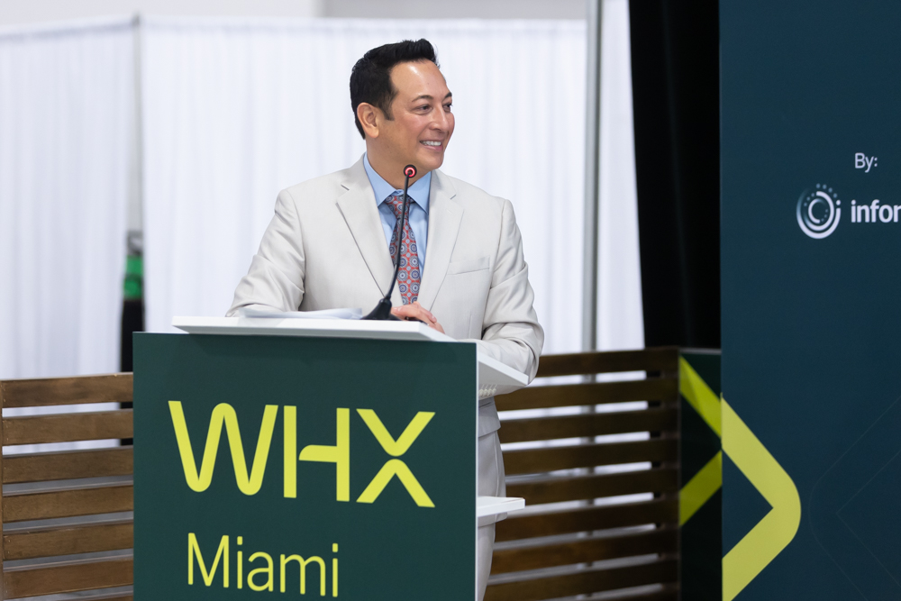 Kenneth C. Wong at the podium at WHX Miami 2025